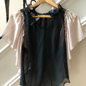 Rachel Roy shear black top with beige sleeve